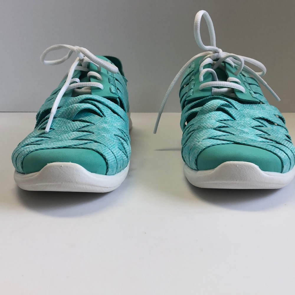 Light blue woman’s athletic shoes